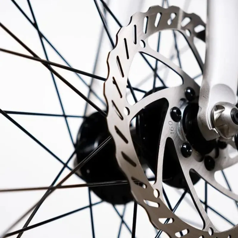 Vélo électrique avec clignotants intégrés Ellipse E2ST Courroie Fourche Suspendue