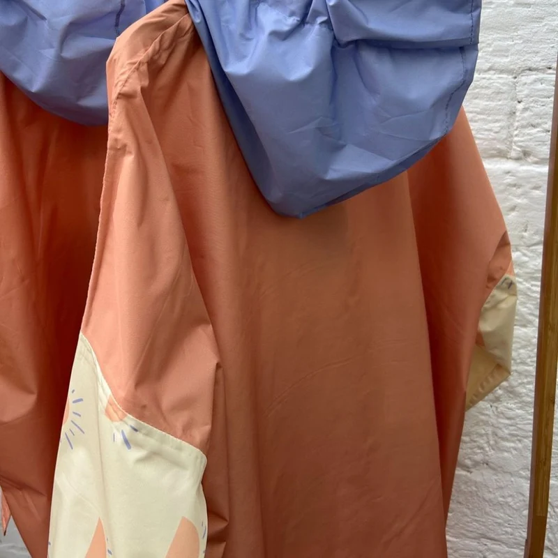 Poncho de pluie Poule Party adulte ou enfant Sunrise